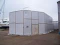 a tented shrink-wrapped enclosure