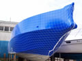 an example of a yacht that we shrink wrapped with cargo netting