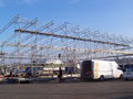 A large scaffold structure about to be shrink wrapped